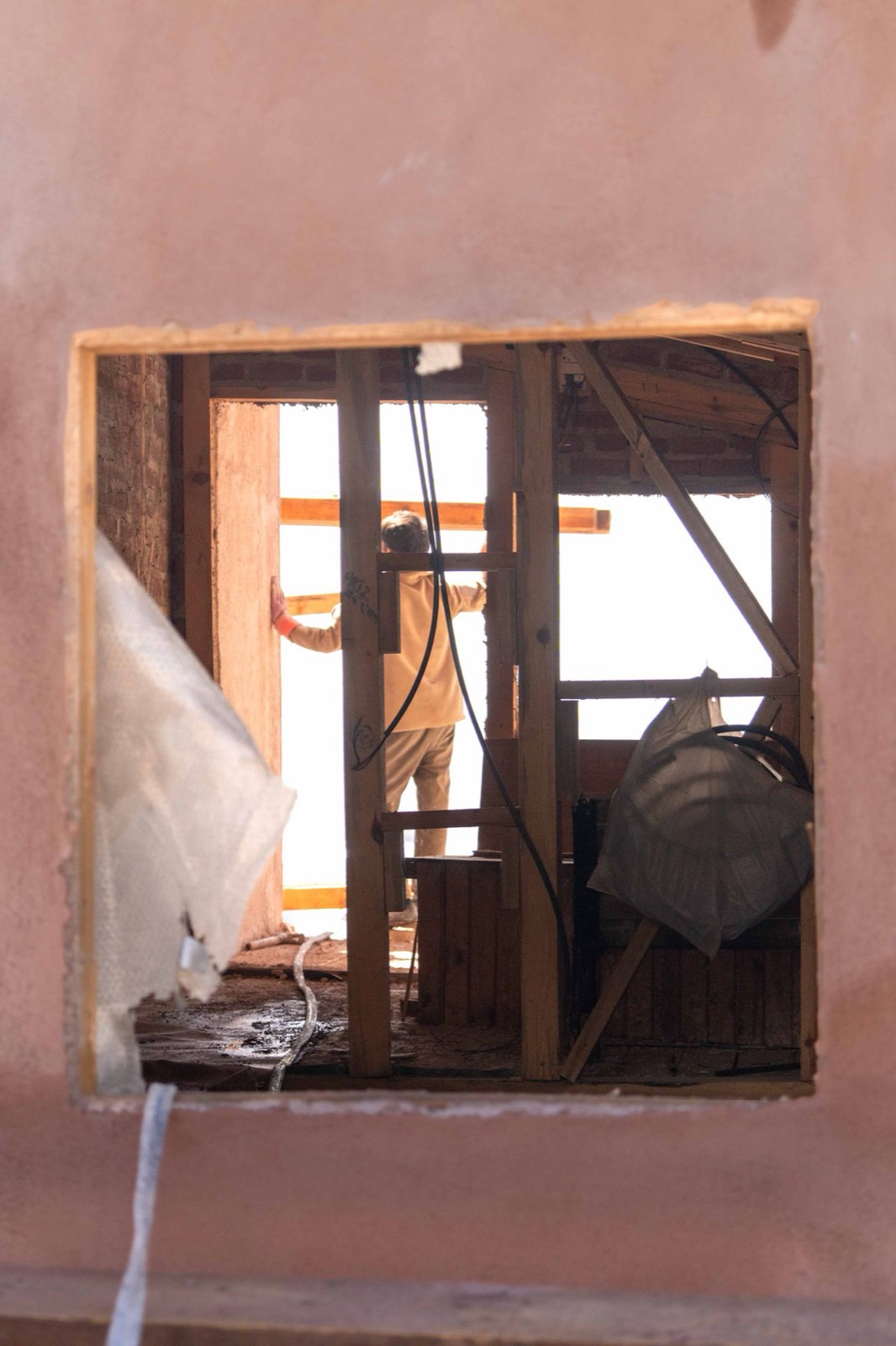 Demo in progress through a framed wall opening